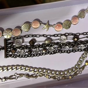Lot of 4 bracelets, all wearable and in great condition.